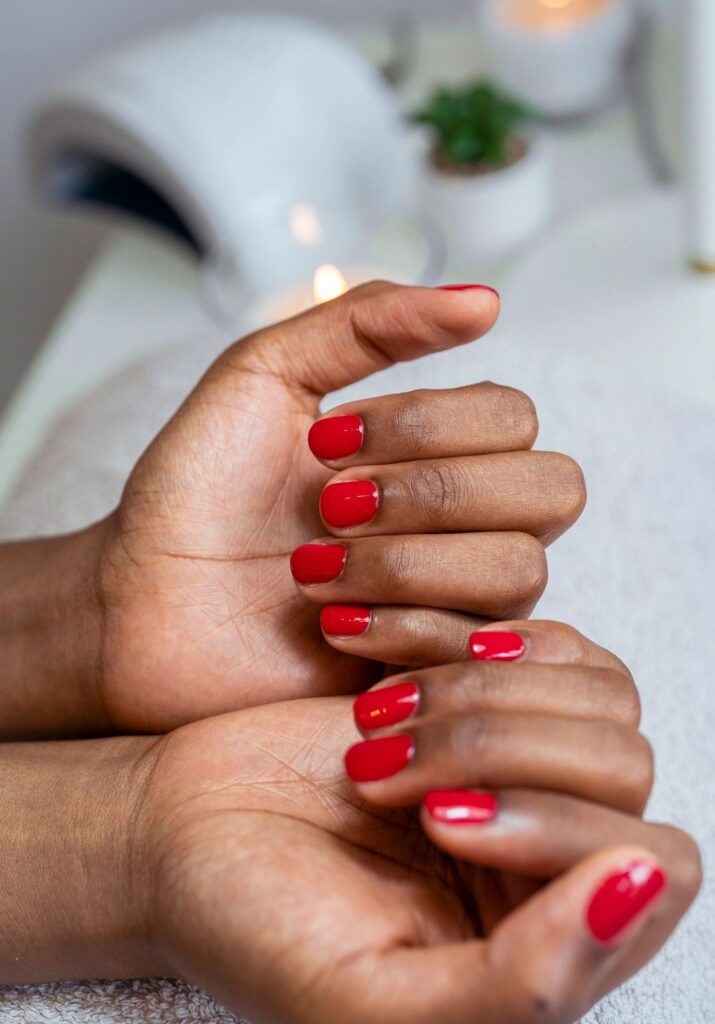Close up of female hands having manicure treatment